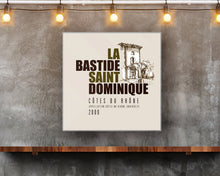 Load image into Gallery viewer, Wine Room Decor - La Bastide Saint Dominique Winery Cotes du Rhone Label Printed on Eco-Friendly Recycled Aluminum hung on modern wall